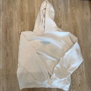 Cream Hoodie with Blue Logo